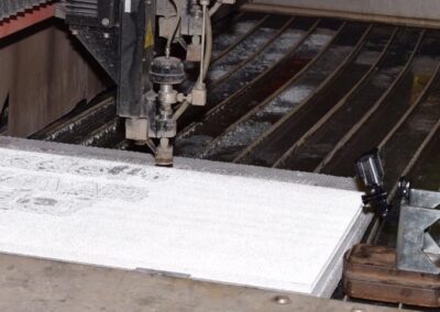 How does waterjet cutting eliminate profiling processes and increase efficiency?